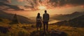 Couple Watching Sunset Mountain Outdoors Concept Royalty Free Stock Photo