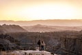 Couple watching the Tabernas Desert (Spanish: Desierto de Tabernas) Almeria, Andalusia, Spain