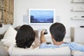 Couple Watching Television In Living Room Royalty Free Stock Photo