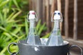 Couple of water bottles in ice bucket at hotel Royalty Free Stock Photo