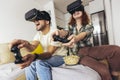 Couple wear the virtual reality glasses are watching and showing imagine via the VR camera