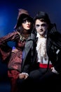 Couple wearing as vampire and witch. Royalty Free Stock Photo