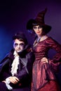 Couple wearing as vampire and witch. Royalty Free Stock Photo