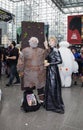 Couple wearing costumes at NY Comic Con