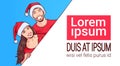 Couple Wearing Santa Hats Hold Banner With Copy Space Man And Woman Winter Holiday Advertisement Christmas Sale Concept