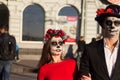 A couple, wearing skull make-up for. All souls day. Boy and girl sugar skull makeup. Ukraine Kharkov Halloween October 31