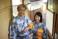 A couple wearing a smiling yukata