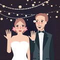 Couple at wedding show their ring party at night light string hanging