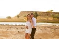 Couple in white dancing on the background of sunset Royalty Free Stock Photo