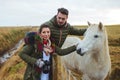 Couple and White Iceland Horse Royalty Free Stock Photo