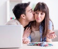 Couple wnning money in online casino Royalty Free Stock Photo
