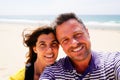 Couple woman and man handsome boyfriend happy family taking selfie self portrait smartphone camera with fun on sand beach Royalty Free Stock Photo