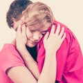 Couple. Woman is sad and being consoled by his partner Royalty Free Stock Photo