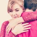 Couple. Woman is sad and being consoled by his partner Royalty Free Stock Photo