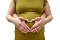 A couple of women making a heart shape on the pregnant belly wit Royalty Free Stock Photo