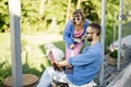 Couple work on laptop computer on nature