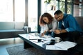 Couple working on budget, finance and bills with notes on payment for loan, mortgage and debt while at home. Financial Royalty Free Stock Photo