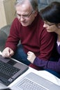 Couple working on laptops Royalty Free Stock Photo
