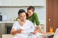 Portrait of a young couple working out finances at home Royalty Free Stock Photo