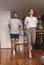 Couple working out together at home Royalty Free Stock Photo