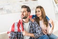 couple wrapped in American flag Royalty Free Stock Photo