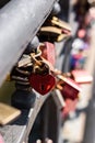 Couple's love locks attached to the railing of a bridge in the port of Hamburg