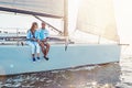 Couple, yacht cruise and ocean in summer with sunshine, love and romance on outdoor adventure. Happy couple, boat and