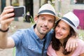 Couple of young attractive tourists discovering city on holidays Royalty Free Stock Photo