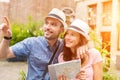 Couple of young attractive tourists discovering city on holidays Royalty Free Stock Photo