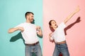 A couple of young man and woman dancing hip-hop at studio. Royalty Free Stock Photo