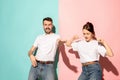 A couple of young man and woman dancing hip-hop at studio. Royalty Free Stock Photo