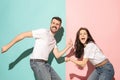 A couple of young man and woman dancing hip-hop at studio. Royalty Free Stock Photo