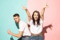 A couple of young man and woman dancing hip-hop at studio. Royalty Free Stock Photo