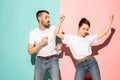 A couple of young man and woman dancing hip-hop at studio. Royalty Free Stock Photo