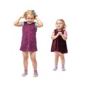 Couple young little girls standing over isolated white background Royalty Free Stock Photo