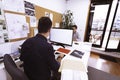 A couple of young male architect working smart from the office elaborating projects and designs. Two young man working on a Royalty Free Stock Photo