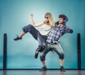 Couple of young man and woman dancing hip-hop Royalty Free Stock Photo