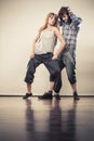 Couple of young man and woman dancing hip-hop Royalty Free Stock Photo