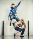 Couple of young man and woman dancing hip-hop Royalty Free Stock Photo