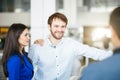 Beautiful happy couple standing near their new car Royalty Free Stock Photo