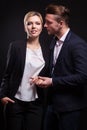 Picture of attractive couple of office workers standing Royalty Free Stock Photo