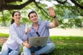 Couple young teen lover hands first greeting and impression to friend at public park,Relaxing time,Happy and smiling