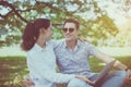 Couple young teen lover sitting and using laptop computer together at park,Romantic and enjoying in moment of happiness time,Happy Royalty Free Stock Photo