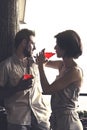 Couplein love having spritz time in a terrace Royalty Free Stock Photo