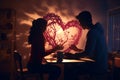 Couples Creating HeartShaped Shadow Puppets on Royalty Free Stock Photo