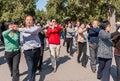Couples dance forward in park of Temple of Heaven, Beijing, China