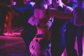 Couples dancing traditional latin argentinian dance milonga in the ballroom, tango salsa bachata kizomba lesson in the red and Royalty Free Stock Photo