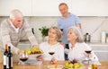 Couples of elderly women and men chatting and drinking Royalty Free Stock Photo