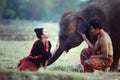 Couples enjoying with elephant lifestyles young people in Surin