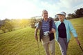 Couples golf. a smiling senior couple enjoying a day on the golf course. Royalty Free Stock Photo